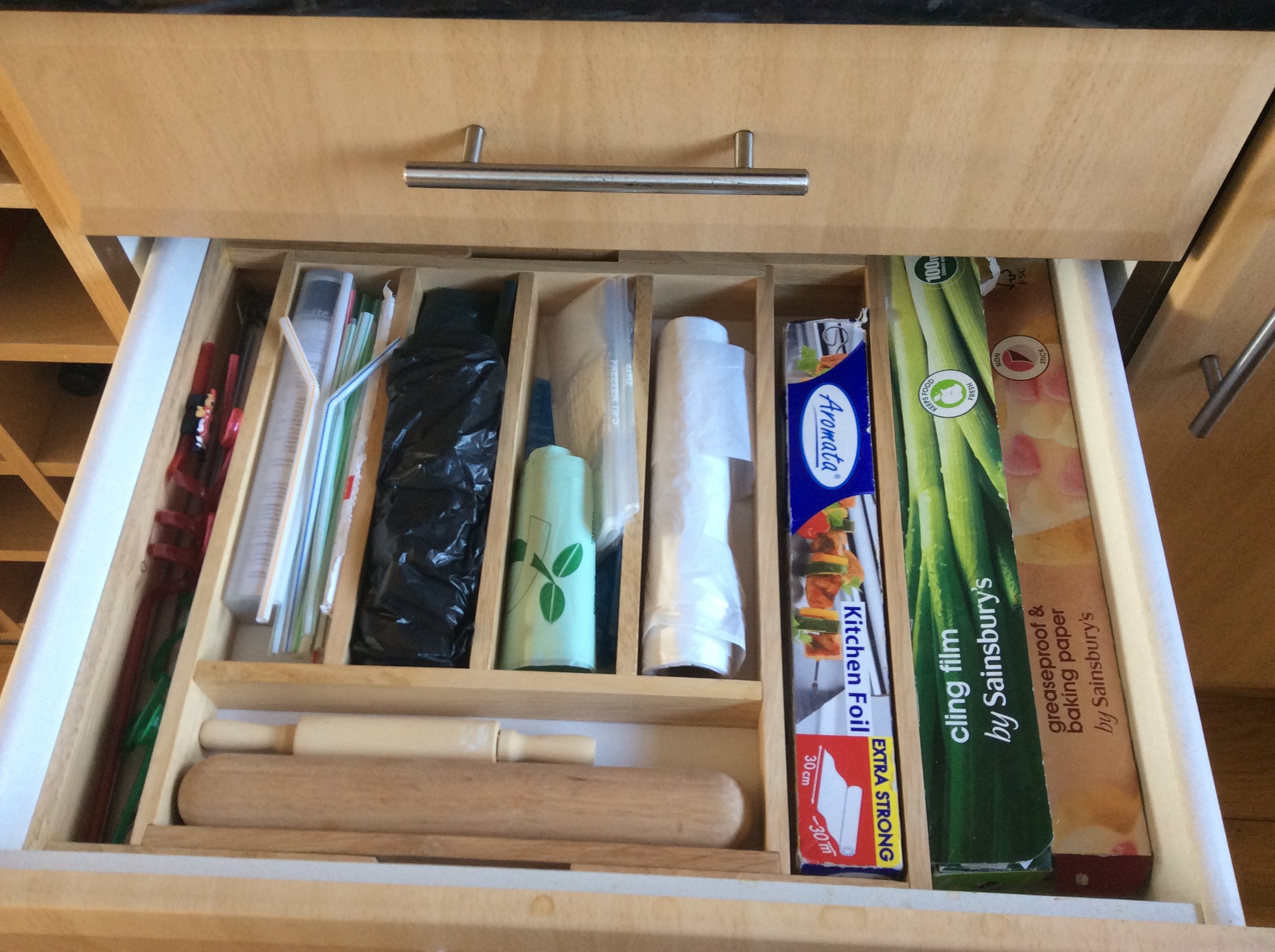 An organised kitchen drawer using a quick and simple drawer accessory